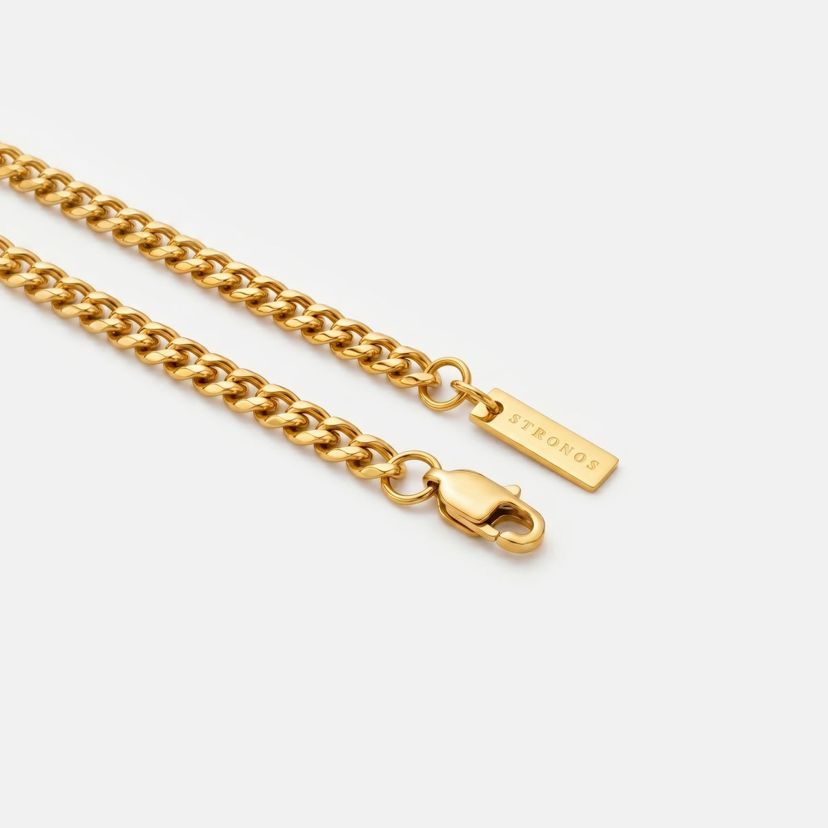 5mm gold cuban curb chain necklace with clasp on a white background